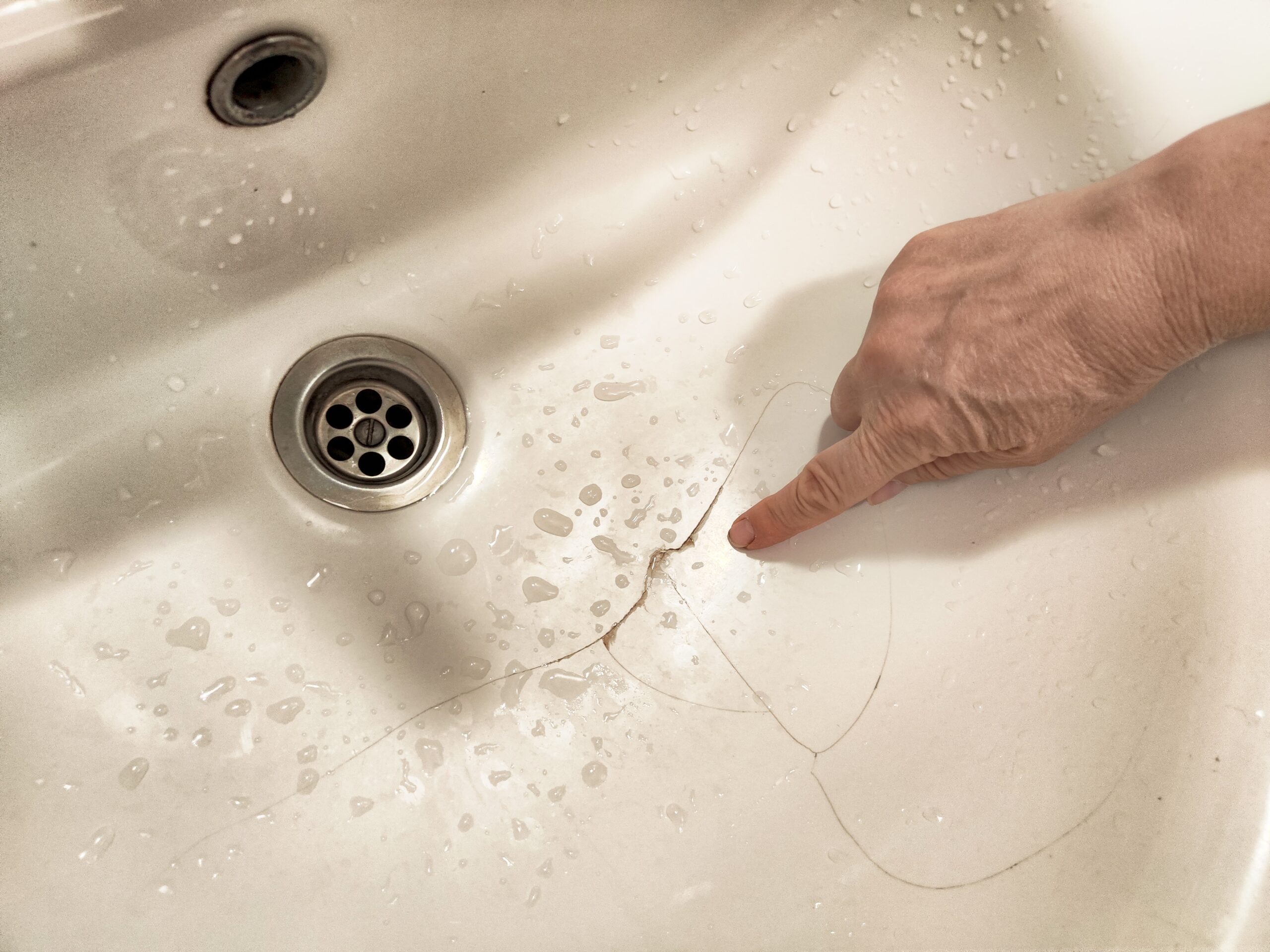 Why Cultured Marble Vanity Tops Crack Near the Sink Bowl and How to Restore Them